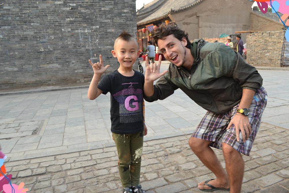 padre con bambino a pingyao