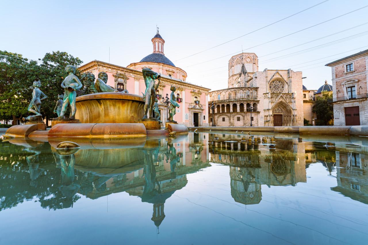 valencia cathedral reflected still water plaza de la virgen landmark