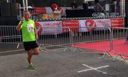 Home straight: Martin Love arrives at the finish line after a long day.