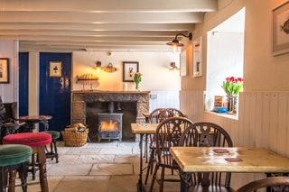 All pubs should look like this  low ceilings flagstone floors and cheery green velvet upholstery. Chef Ben Tunnicliffe...