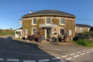 With its low ceilings and flagstone floors worn shiny with use this listed 19thcentury inn boasting a Michelin Bib...